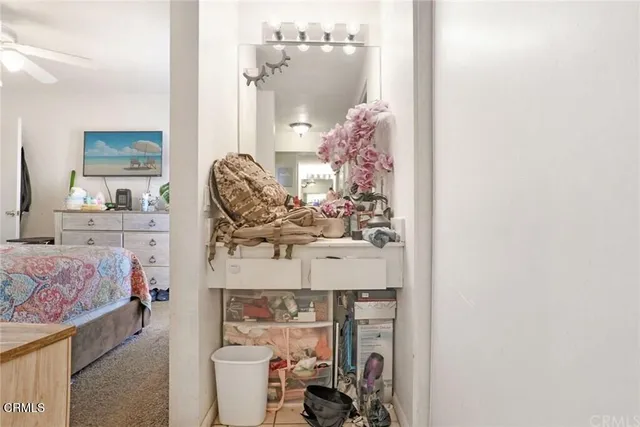 a room with furniture and a mirror