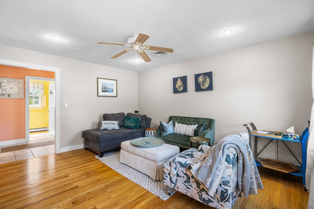 898 Main Street West Wareham, MA 02576 - Photo 12 of 36 a living room with furniture and a wooden floor