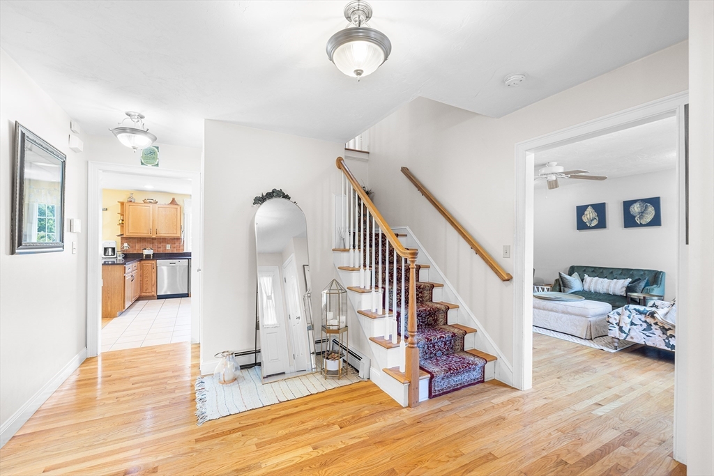 898 Main Street West Wareham, MA 02576 - Photo 17 of 36 a view of entryway livingroom and hall with wooden floor