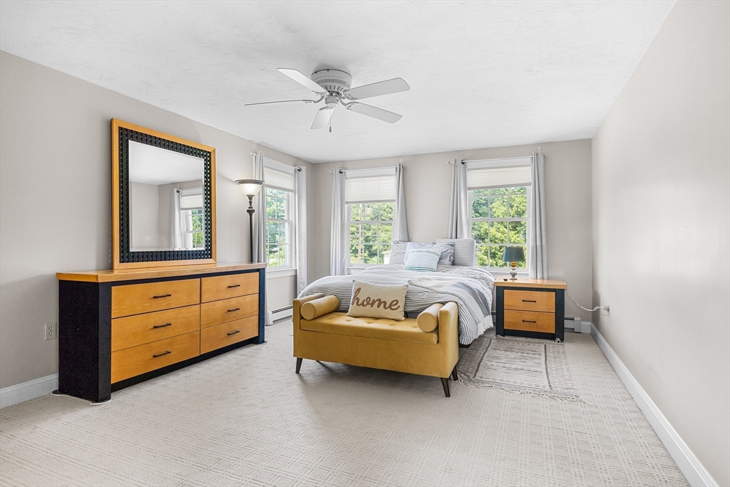 898 Main Street West Wareham, MA 02576 - Photo 18 of 36 a bedroom with a bed and a couch