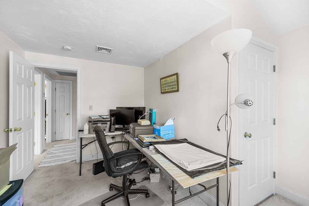 898 Main Street West Wareham, MA 02576 - Photo 27 of 36 a view of a workspace with furniture and a window