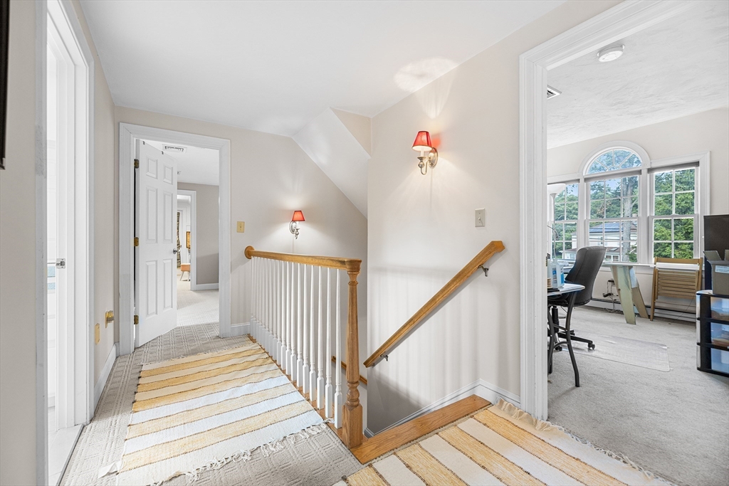 898 Main Street West Wareham, MA 02576 - Photo 29 of 36 a view of a hallway with wooden floor and stairs