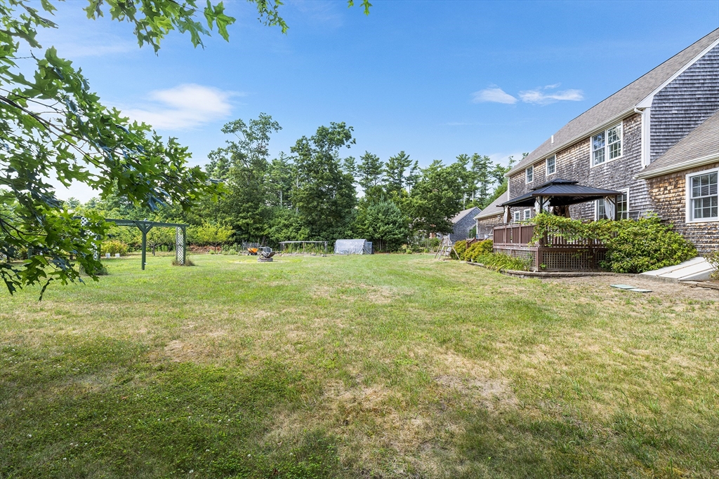 898 Main Street West Wareham, MA 02576 - Photo 33 of 36 a front view of a house with a yard