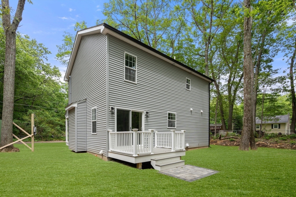 75 Hiland Road Charlton, MA 01507 - Photo 27 of 38 a view of a house with backyard