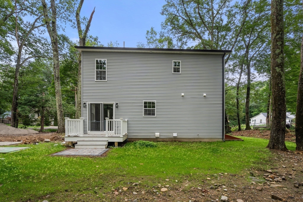 75 Hiland Road Charlton, MA 01507 - Photo 28 of 38 a view of house with backyard