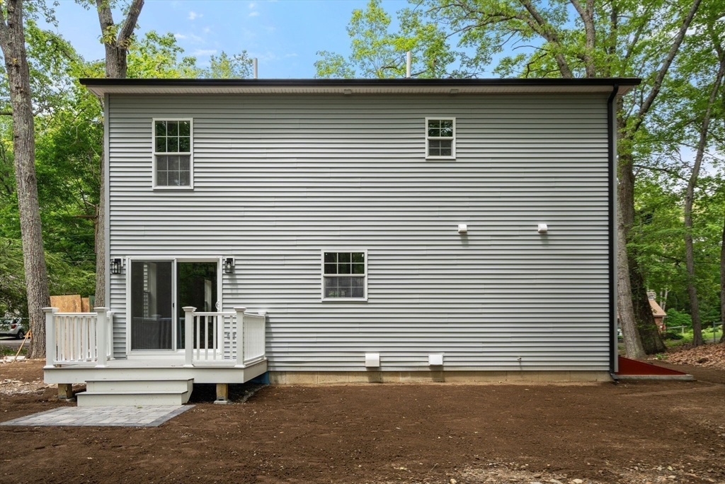 75 Hiland Road Charlton, MA 01507 - Photo 36 of 38 a side view of a house