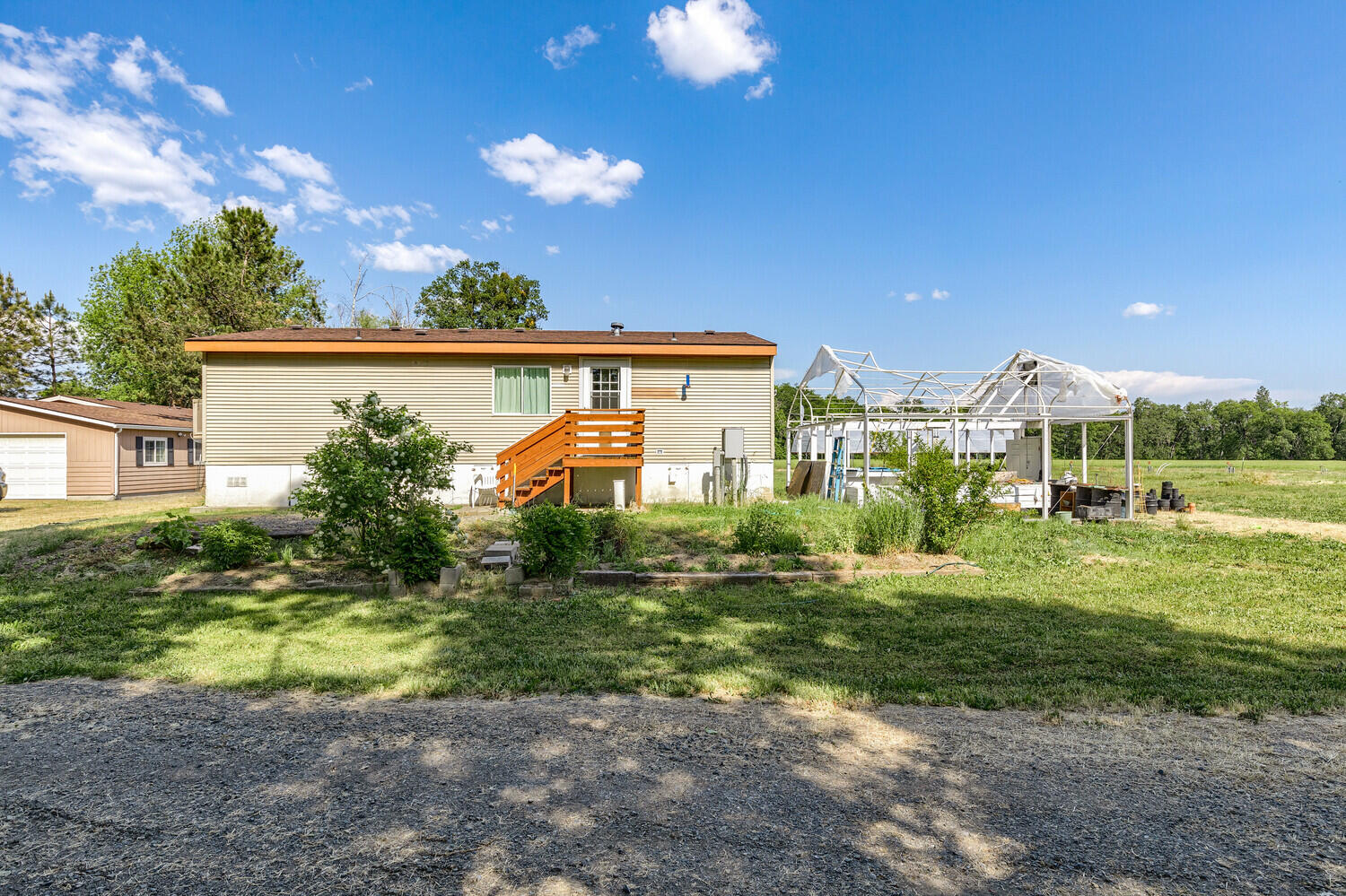 10710 Meadows Road White City, OR 97503 - Photo 28 of 46 a front view of a house with garden