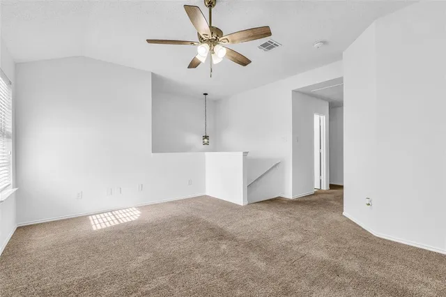 a view of a room with an empty space