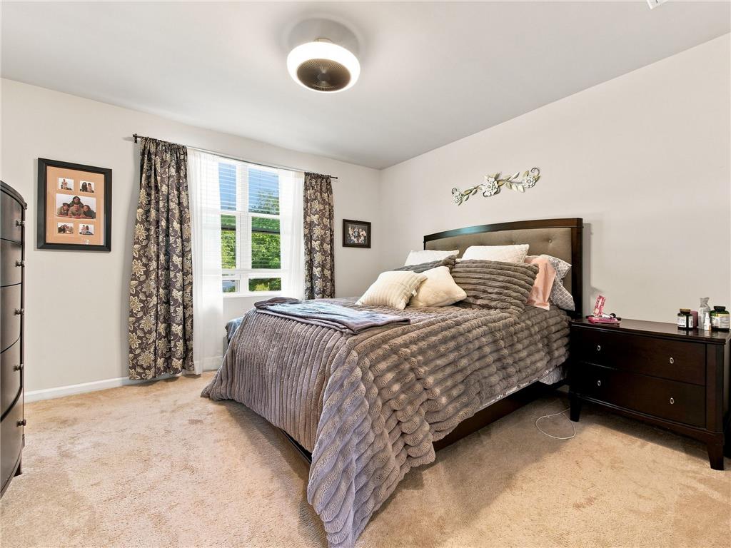 2133 Cross Country Road Northampton, PA 18067 - Photo 33 of 44 Soft carpeting underfoot and an abundance of natural light define this restful bedroom space.