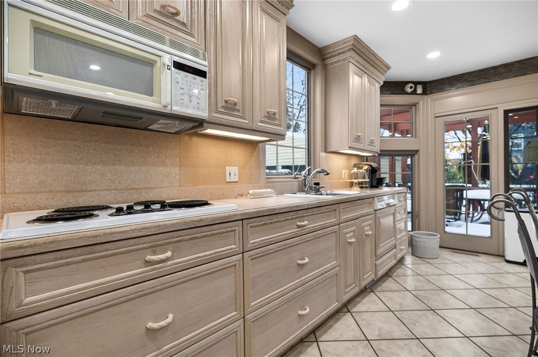3498 Bainbridge Road Cleveland Heights, OH 44118 - Photo 18 of 50 Kitchen with white appliances, light countertops, light tile patterned flooring, and recessed lighting