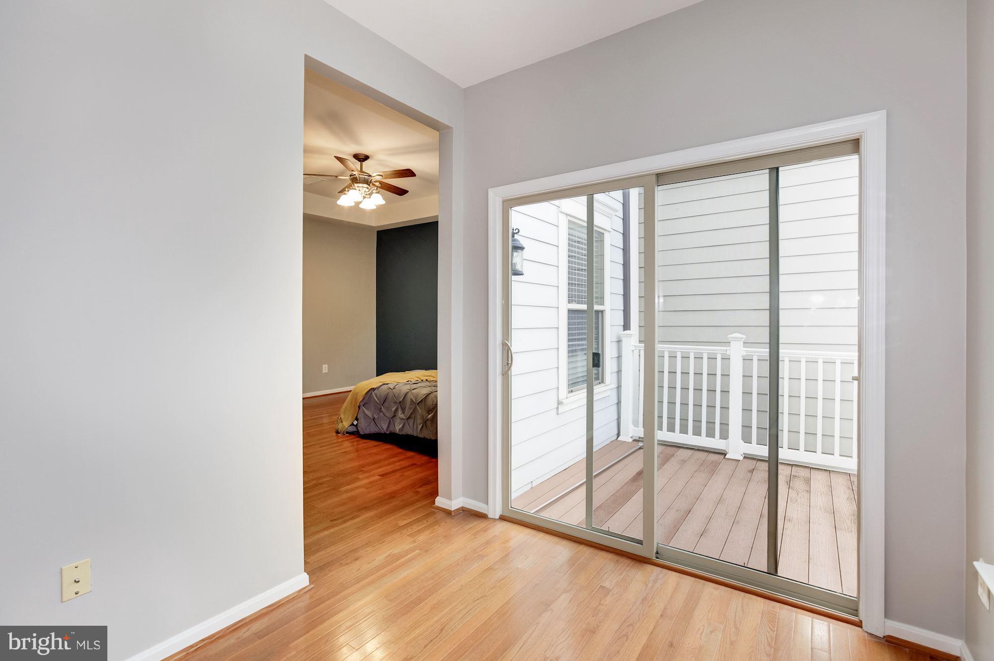 122 South Exeter Street, Unit 126 Baltimore, MD 21202 - Photo 17 of 27 Sitting room and deck off MBR