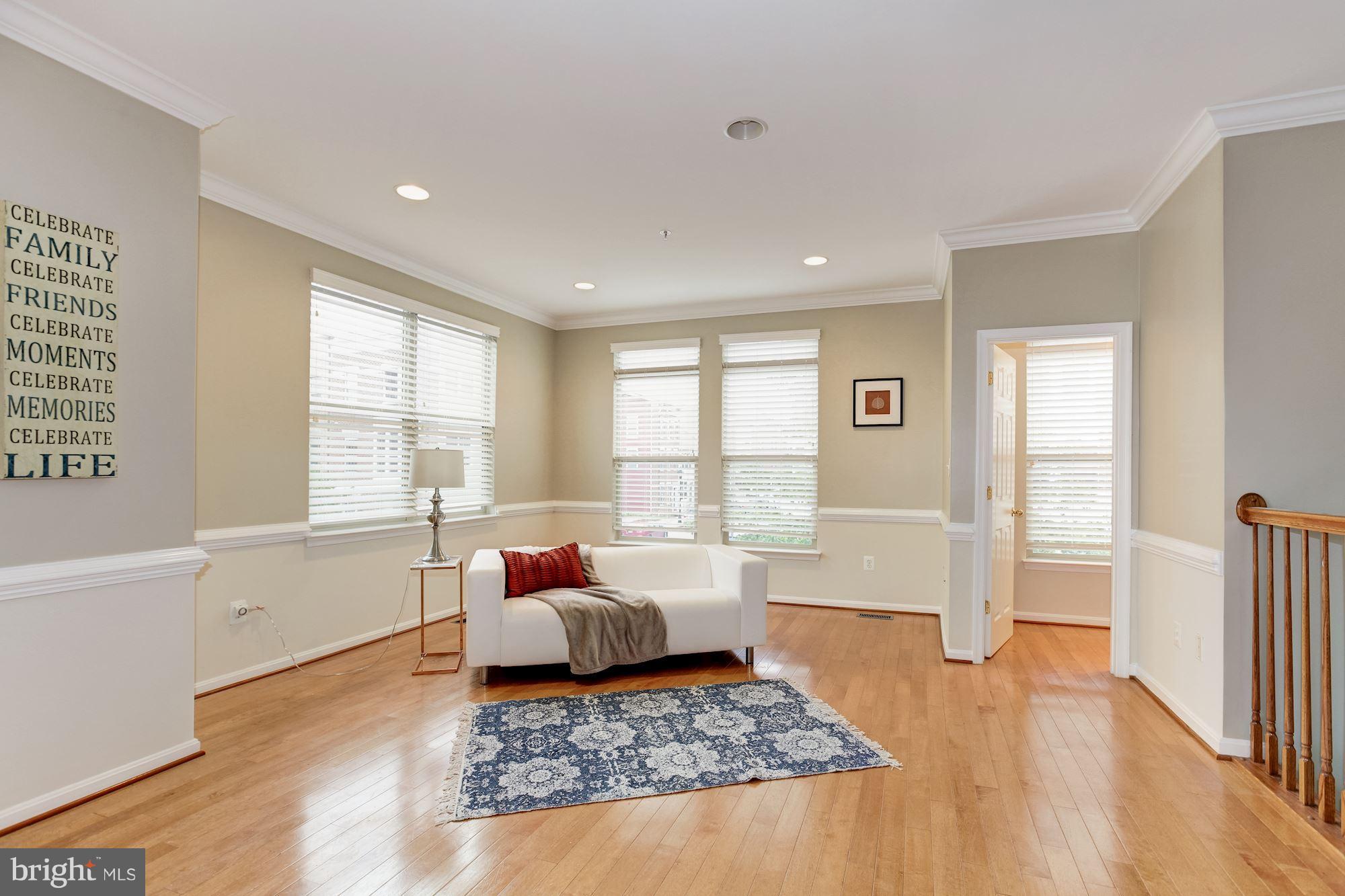 122 South Exeter Street, Unit 126 Baltimore, MD 21202 - Photo 5 of 27 Gleaming hardwoods on main level