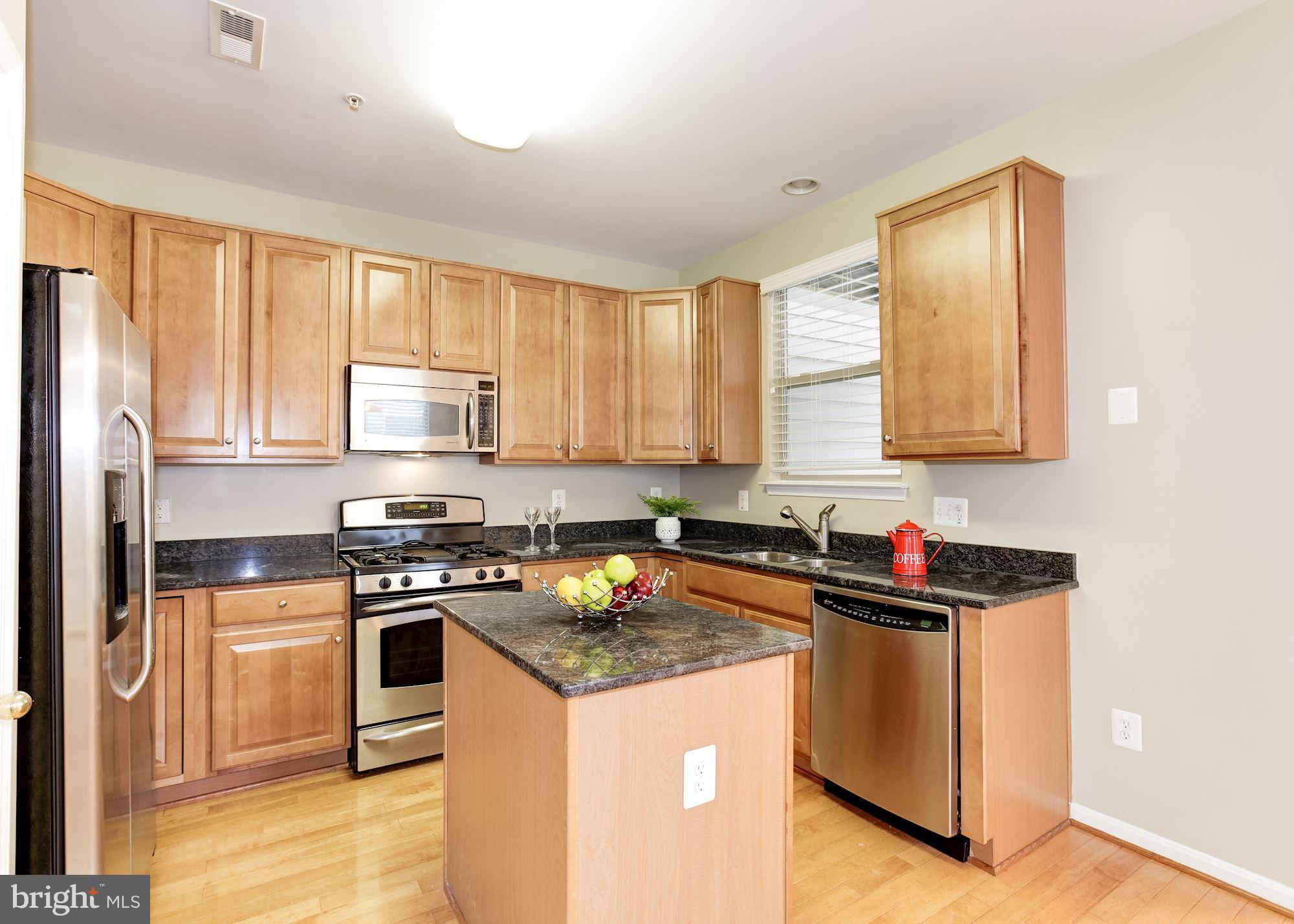 122 South Exeter Street, Unit 126 Baltimore, MD 21202 - Photo 9 of 27 Gourmet kitchen w/ SS appliances