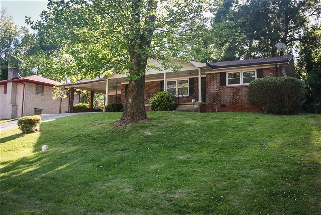 1293 Weston Drive Decatur, GA 30032 - Photo 1 of 1 a view of a house with a yard
