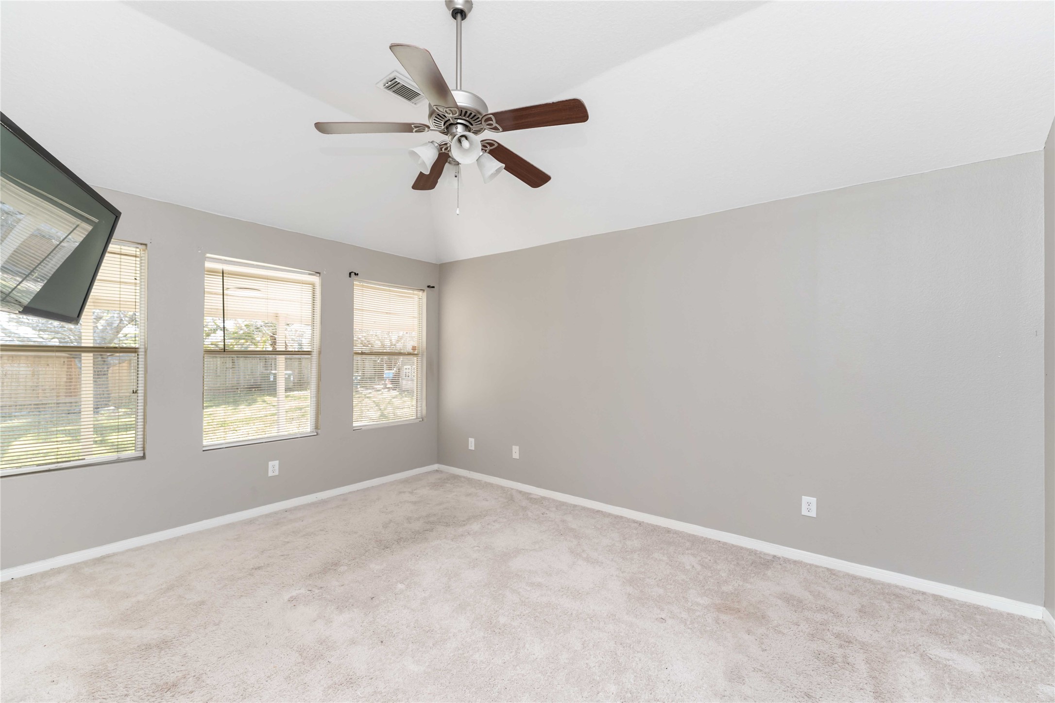 12106 Landsdown Ridge Way Humble, TX 77346 - Photo 11 of 23 a view of an empty room with a window