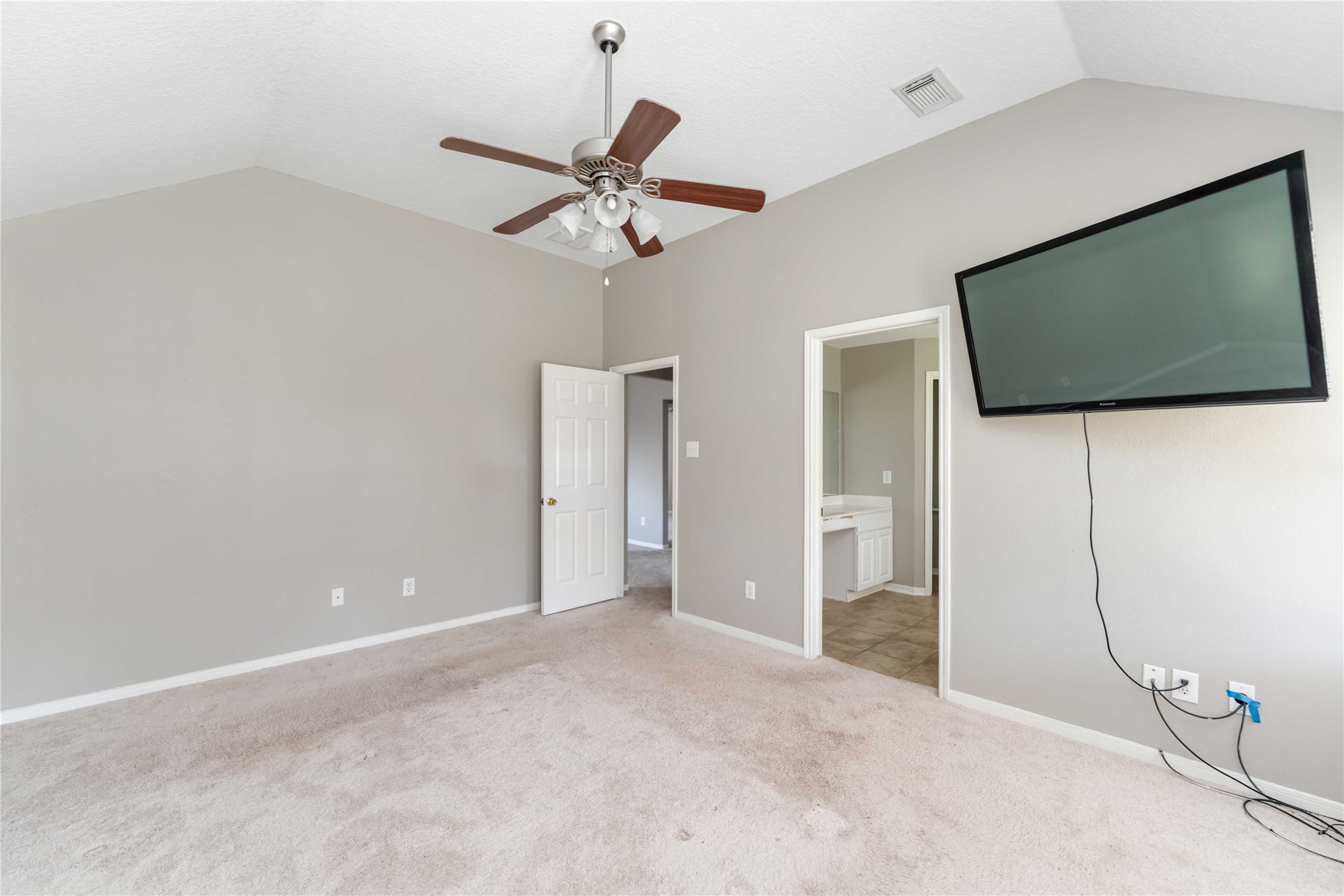 12106 Landsdown Ridge Way Humble, TX 77346 - Photo 12 of 23 a view of a livingroom with a flat screen tv