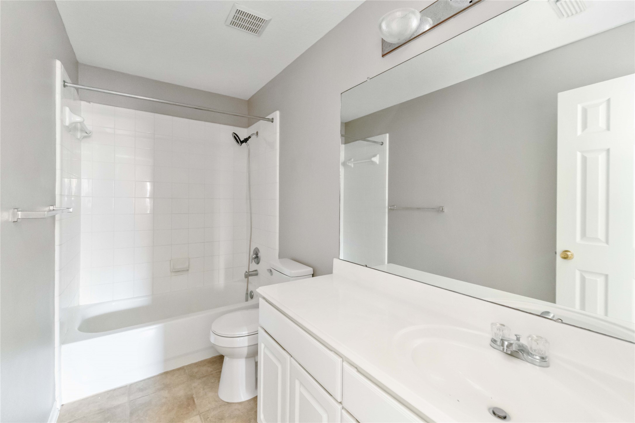 12106 Landsdown Ridge Way Humble, TX 77346 - Photo 18 of 23 a bathroom with a sink a toilet and shower