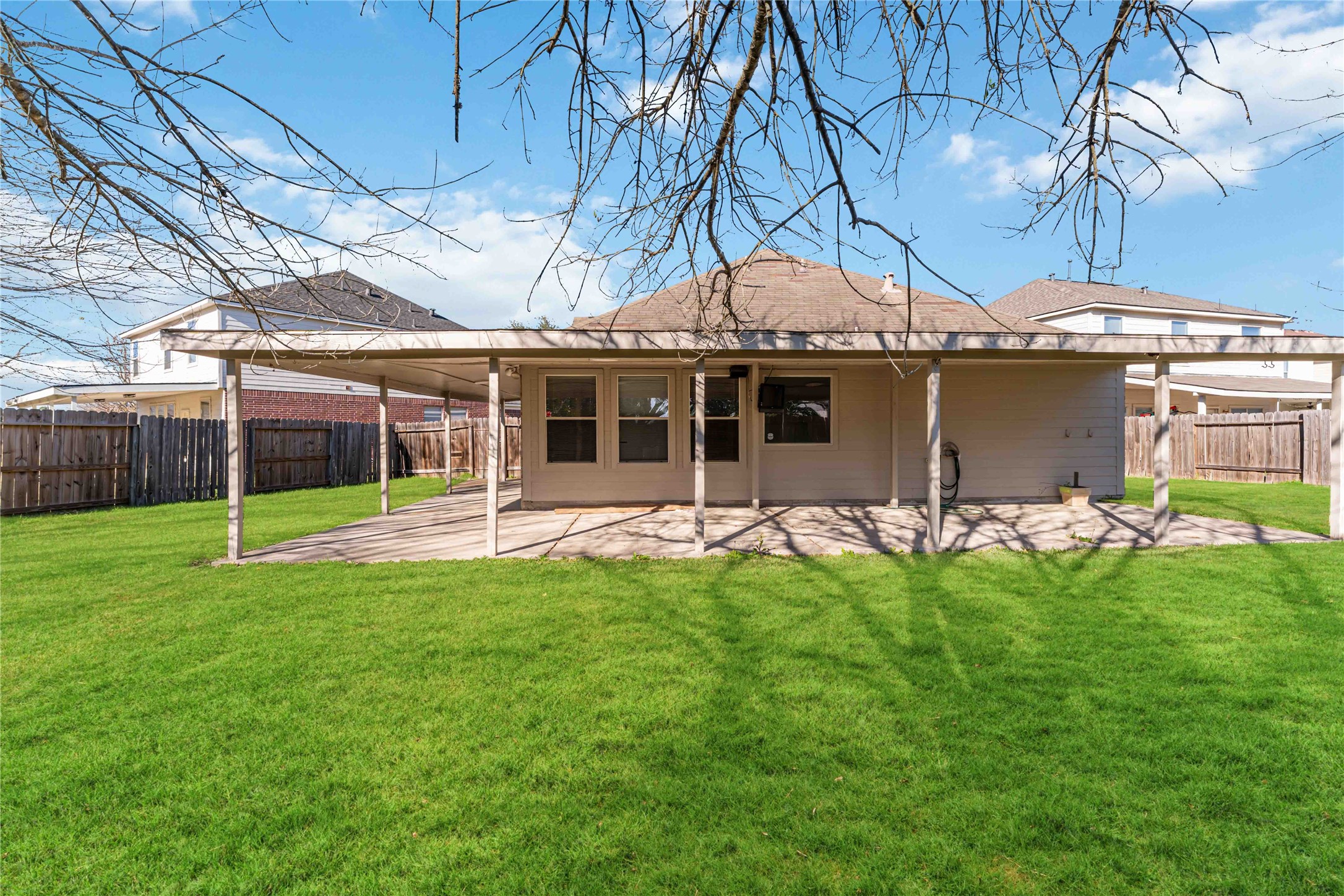 12106 Landsdown Ridge Way Humble, TX 77346 - Photo 23 of 23 a view of a house with a backyard porch and sitting area