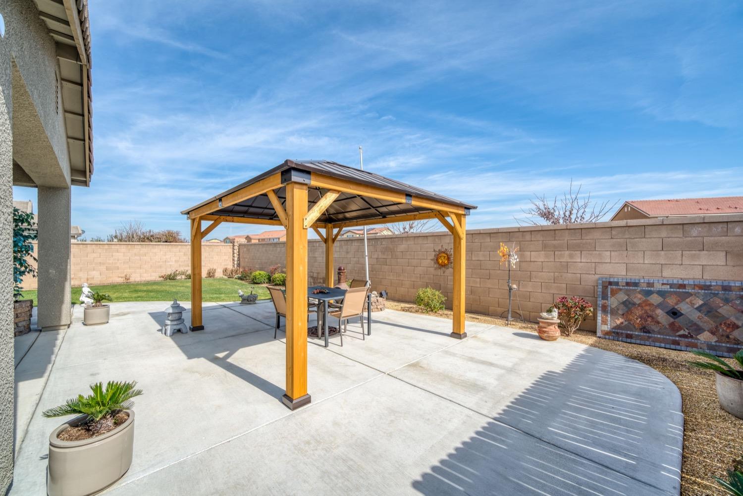 1009 Skylar Lane Clovis, CA 93619 - Photo 20 of 32 a view of a swimming pool with a patio