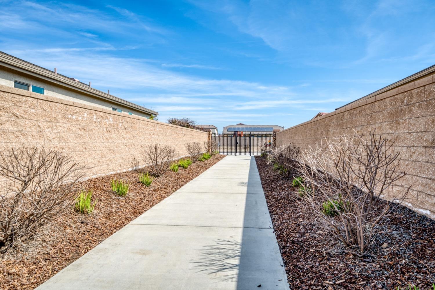 1009 Skylar Lane Clovis, CA 93619 - Photo 30 of 32 a view of a pathway