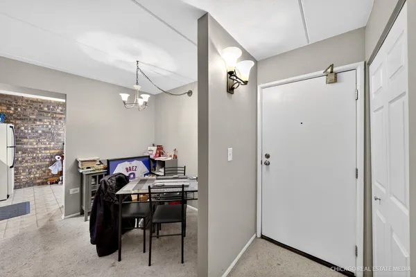 a view of a workspace with furniture