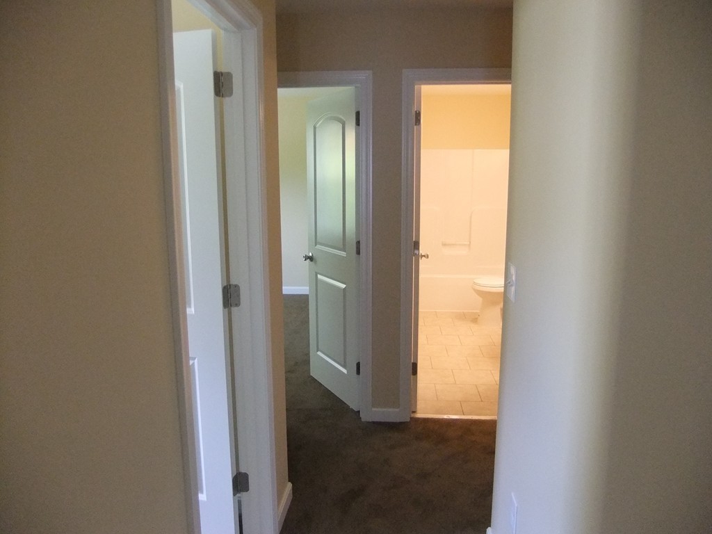 162-164 Corthell Street Springfield, MA 01151 - Photo 16 of 18 a view of a bathroom with a glass door