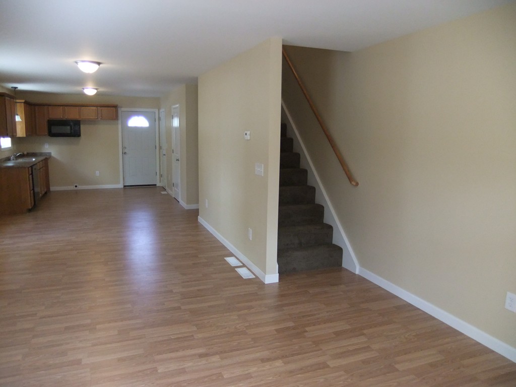 162-164 Corthell Street Springfield, MA 01151 - Photo 5 of 18 a view of a hallway with wooden floor