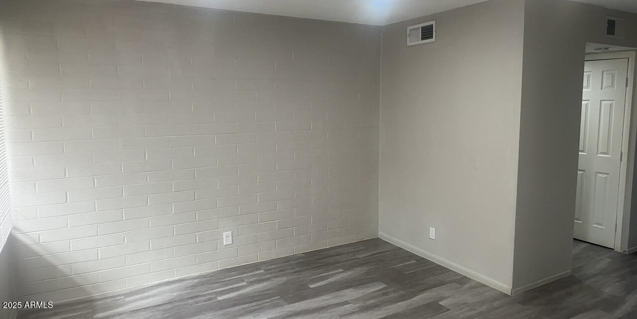 2034 West Cactus Road, Unit C Phoenix, AZ 85029 - Photo 4 of 10 a view of an empty room