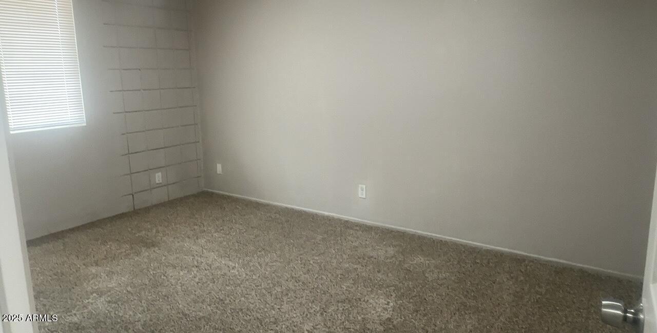 2034 West Cactus Road, Unit C Phoenix, AZ 85029 - Photo 8 of 10 a view of an empty room