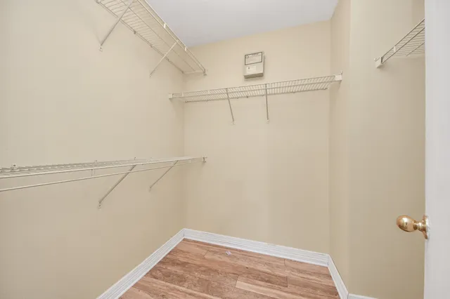 a view of a room with racks on the wall