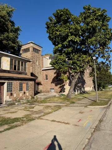 a front view of a house with a ocean view