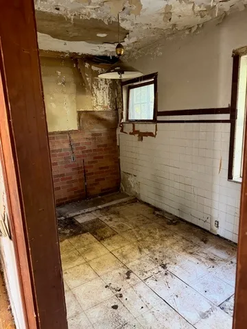 a view of an empty room with window