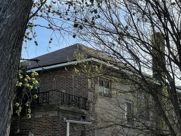 a front view of a house with a ocean view