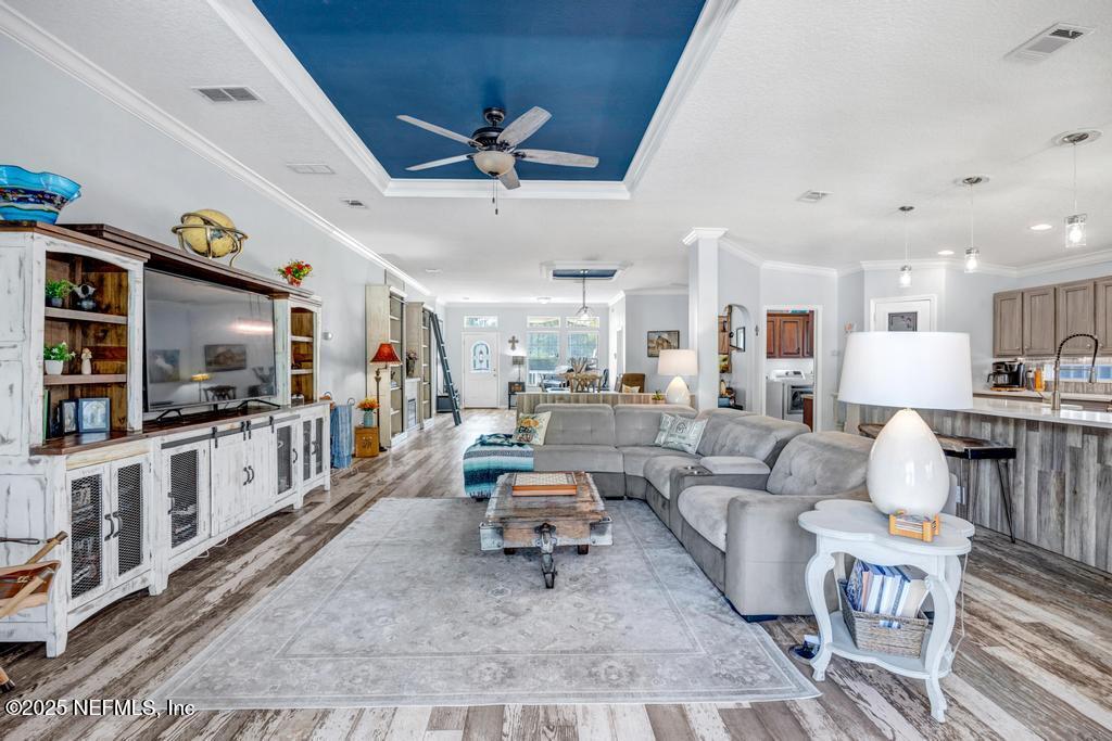 1417 Marlee Road St. Johns, FL 32259 - Photo 15 of 70 a living room with furniture and a flat screen tv