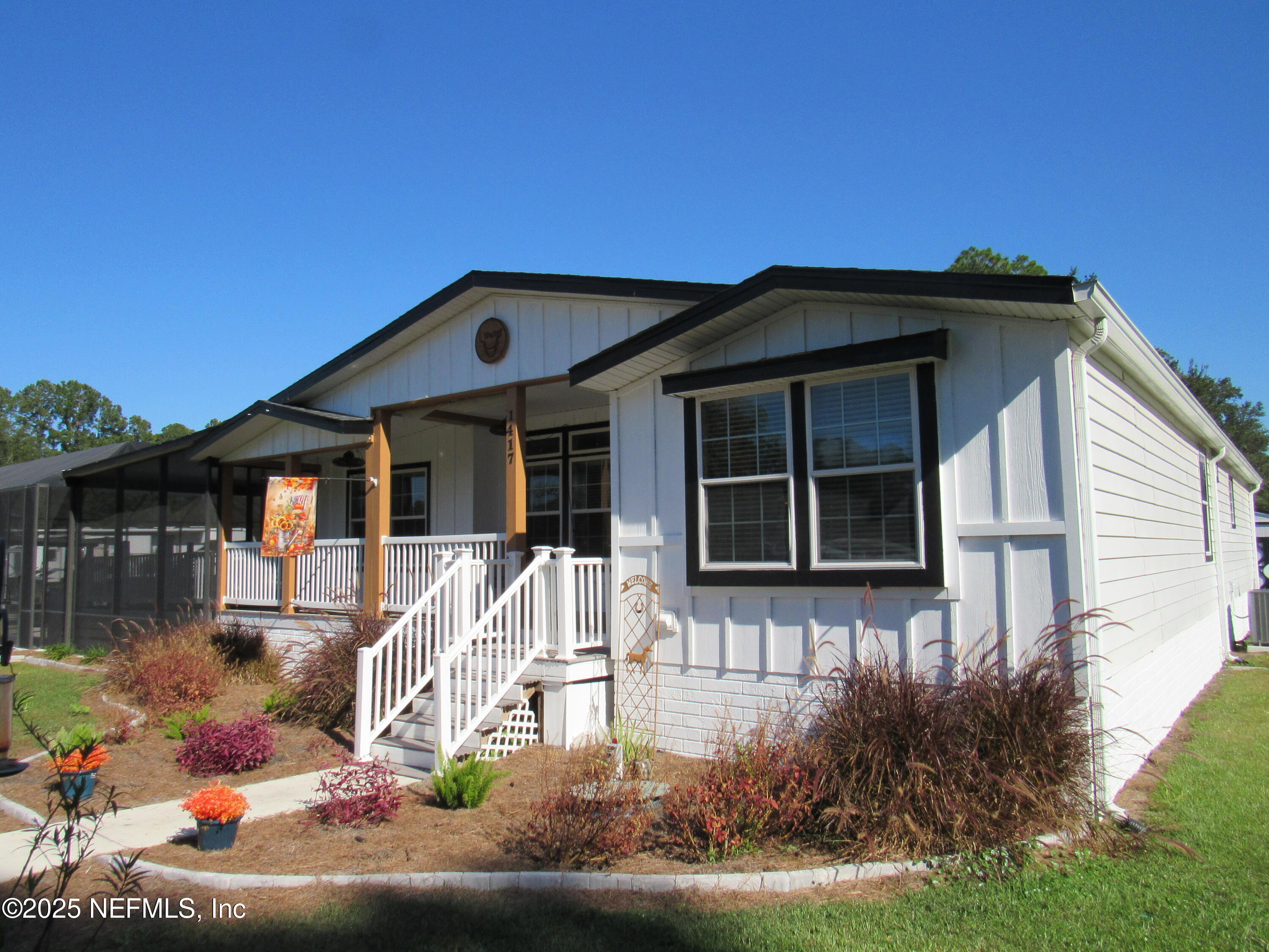 1417 Marlee Road St. Johns, FL 32259 - Photo 5 of 70 a front view of a house with garden