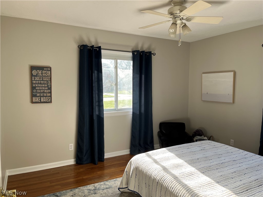 534 Overwood Road Akron, OH 44313 - Photo 14 of 30 Bedroom with ceiling fan and hardwood floors