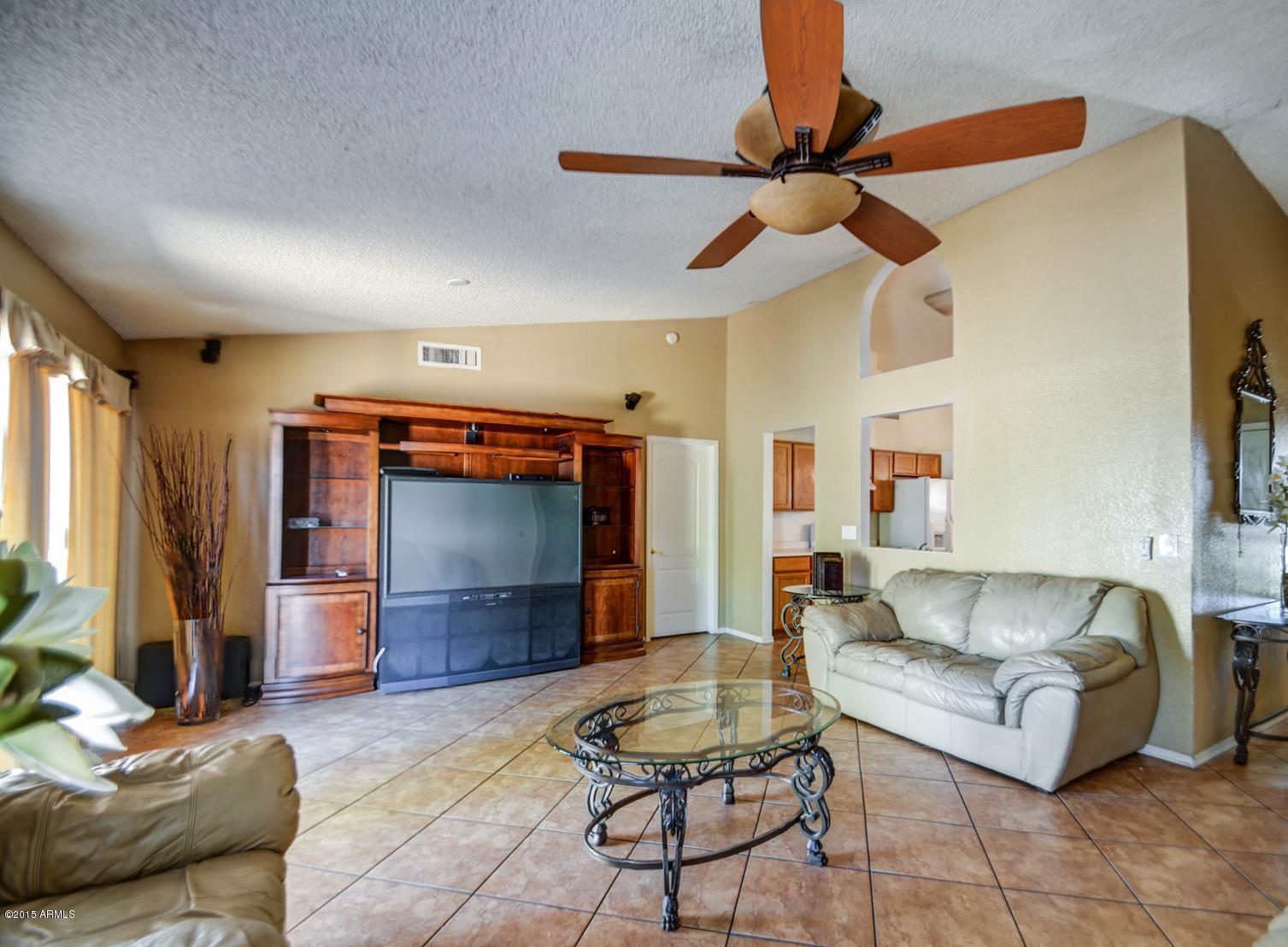 9005 West Berkeley Road Phoenix, AZ 85037 - Photo 8 of 31 family room-4