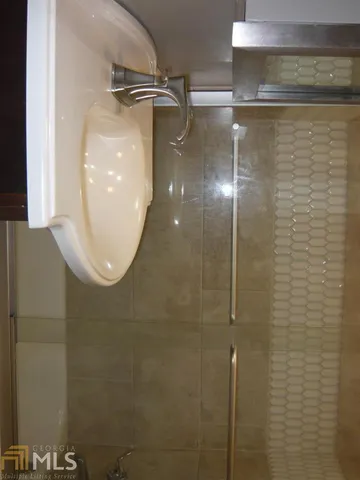 a close view of a shower in bathroom
