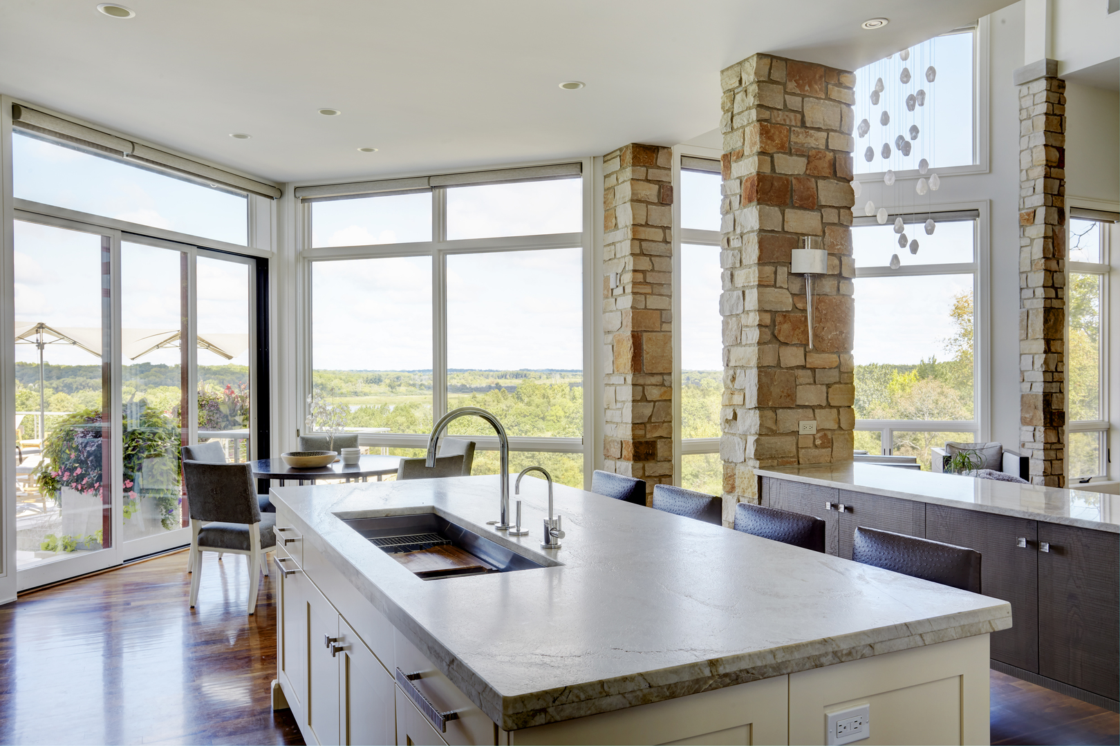 315 South Valley Hill Road Bull Valley, IL 60098 - Photo 18 of 86 a kitchen with a stove a sink and a dining table with garden view