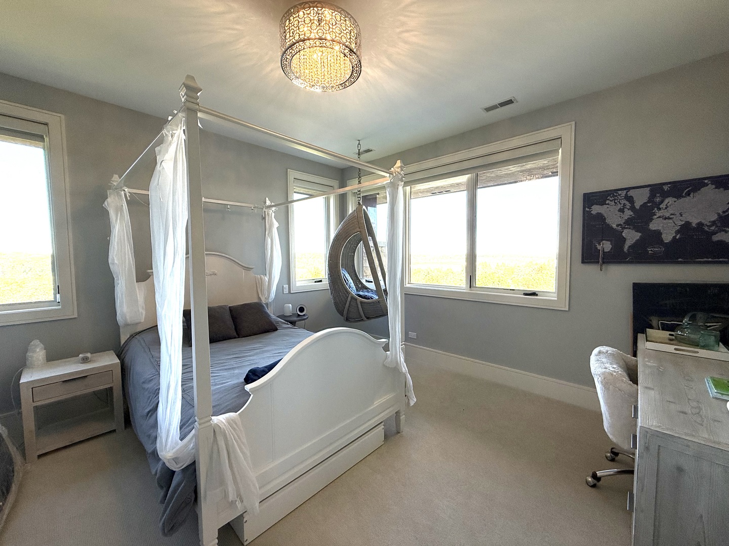 315 South Valley Hill Road Bull Valley, IL 60098 - Photo 27 of 58 a bedroom with a bed window and a chandelier