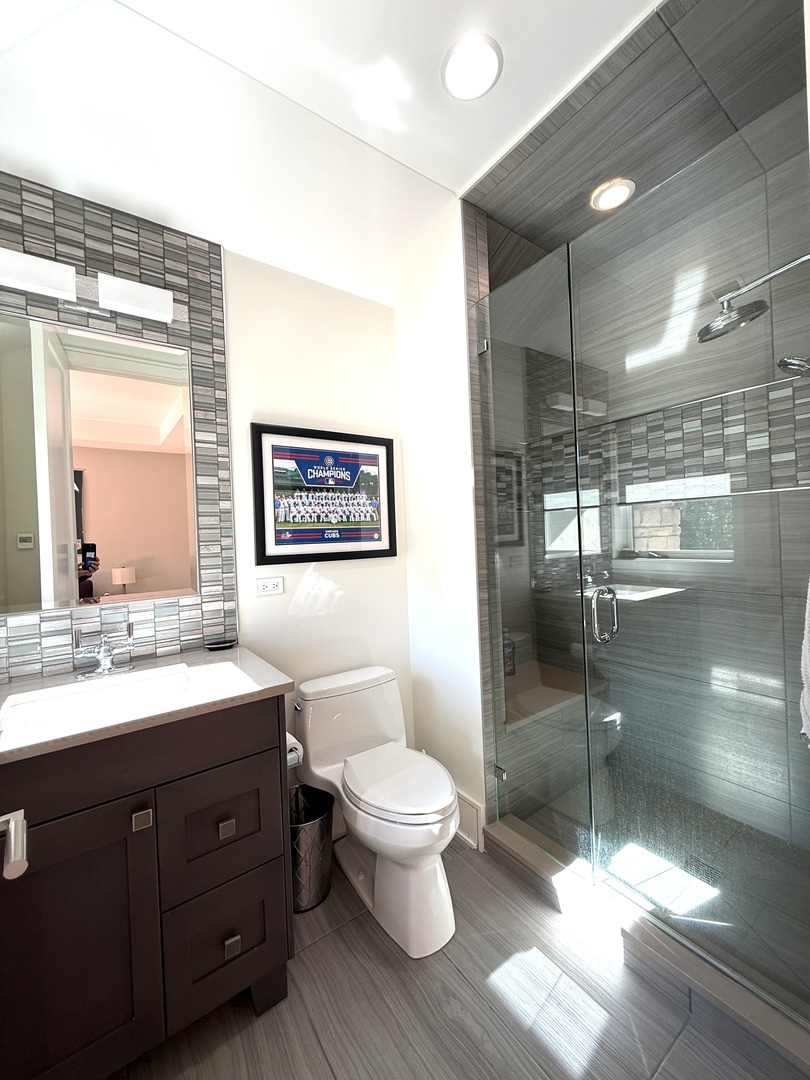 315 South Valley Hill Road Bull Valley, IL 60098 - Photo 42 of 86 a bathroom with a toilet a sink and mirror