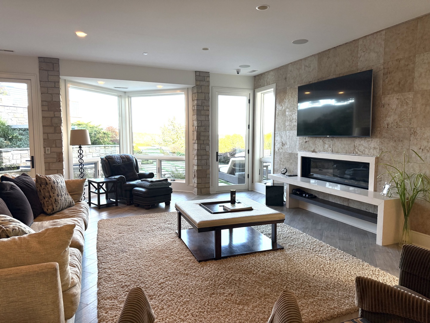 315 South Valley Hill Road Bull Valley, IL 60098 - Photo 50 of 86 a living room with furniture flat screen tv and a fireplace