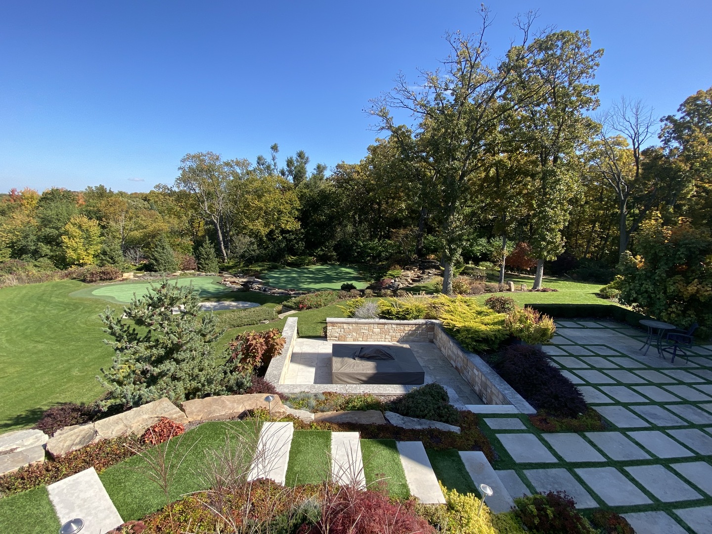 315 South Valley Hill Road Bull Valley, IL 60098 - Photo 51 of 58 a view of a swimming pool with a patio