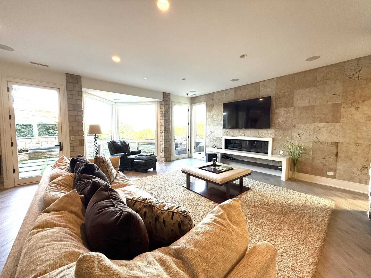315 South Valley Hill Road Bull Valley, IL 60098 - Photo 51 of 86 a living room with furniture and a flat screen tv