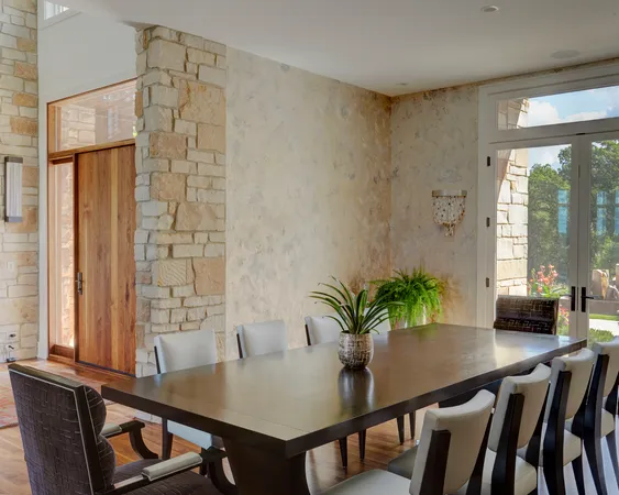 a kitchen with stainless steel appliances a sink stove and cabinets