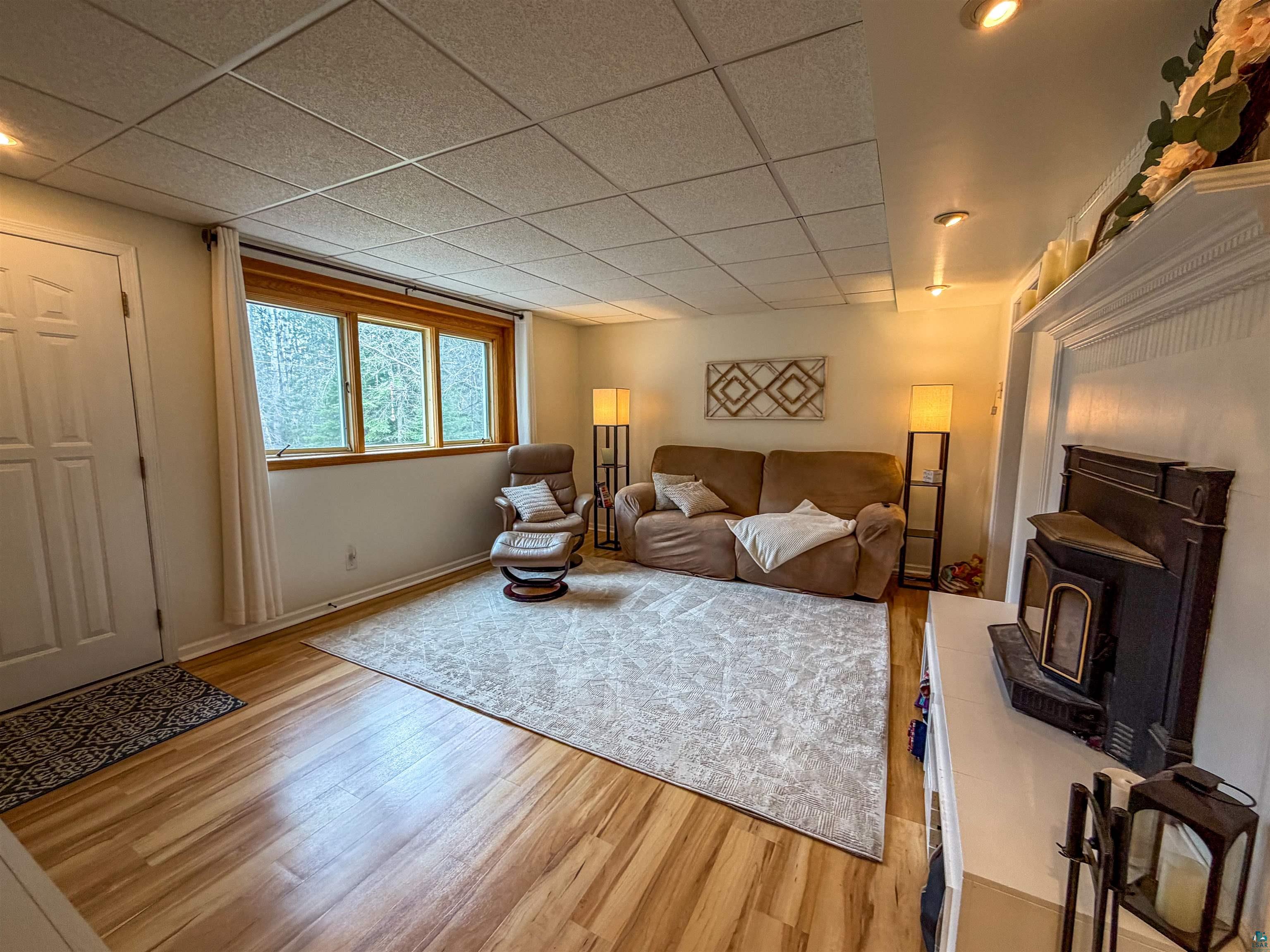 3704 Greysolon Road Duluth, MN 55804 - Photo 24 of 51 Wood-finish flooring throughout, featuring a drop ceiling with recessed lighting