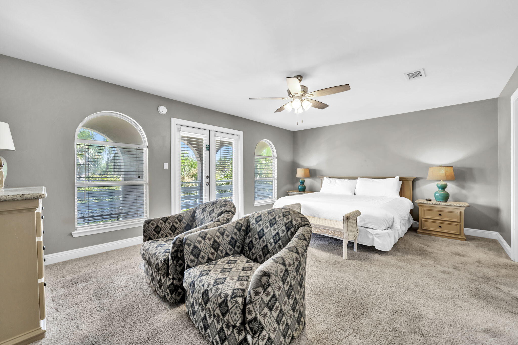 80 Terra Cotta Way Destin, FL 32541 - Photo 28 of 84 a spacious bedroom with a bed couch and window