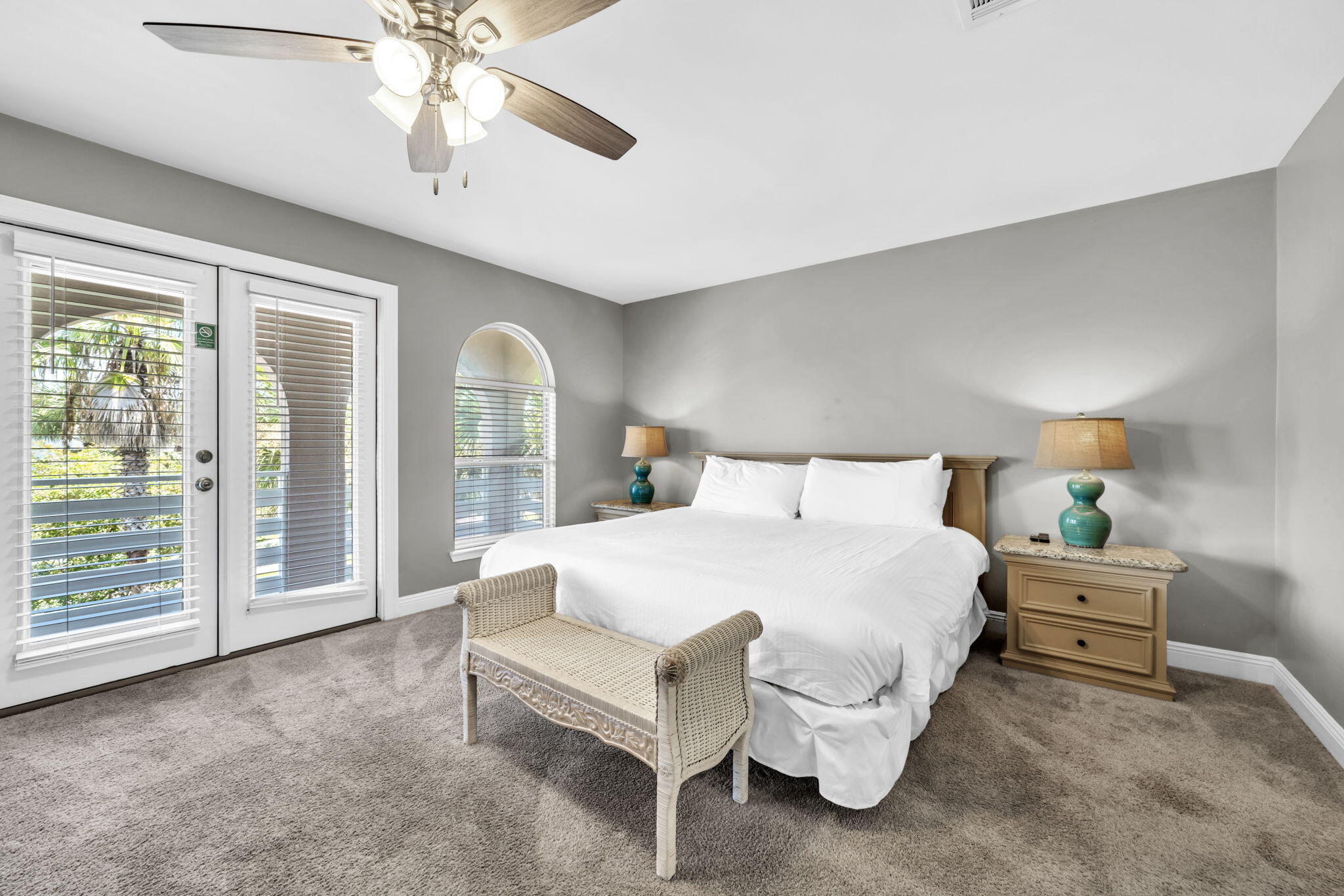 80 Terra Cotta Way Destin, FL 32541 - Photo 31 of 84 a spacious bedroom with a bed and a chandelier