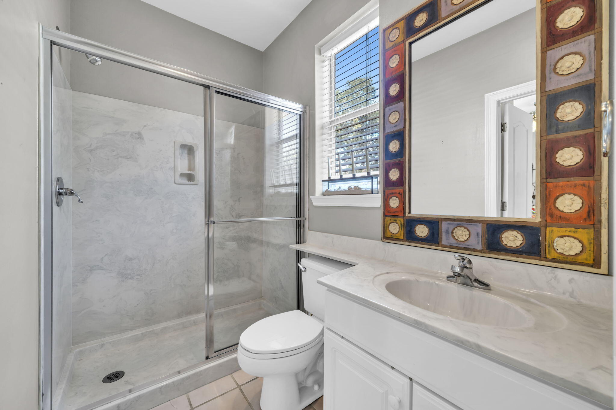 80 Terra Cotta Way Destin, FL 32541 - Photo 35 of 84 a bathroom with a sink and a mirror