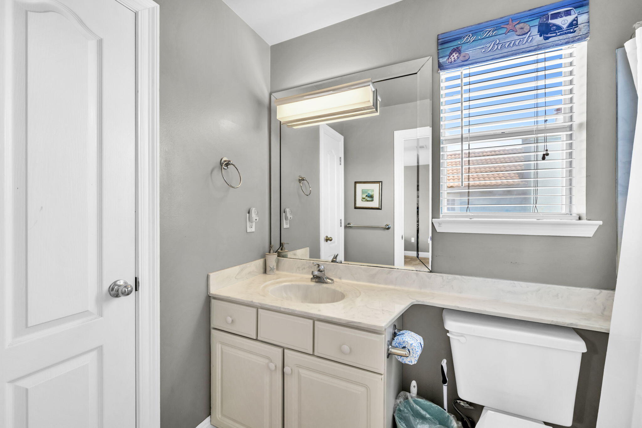 80 Terra Cotta Way Destin, FL 32541 - Photo 41 of 84 a bathroom with a sink and a mirror
